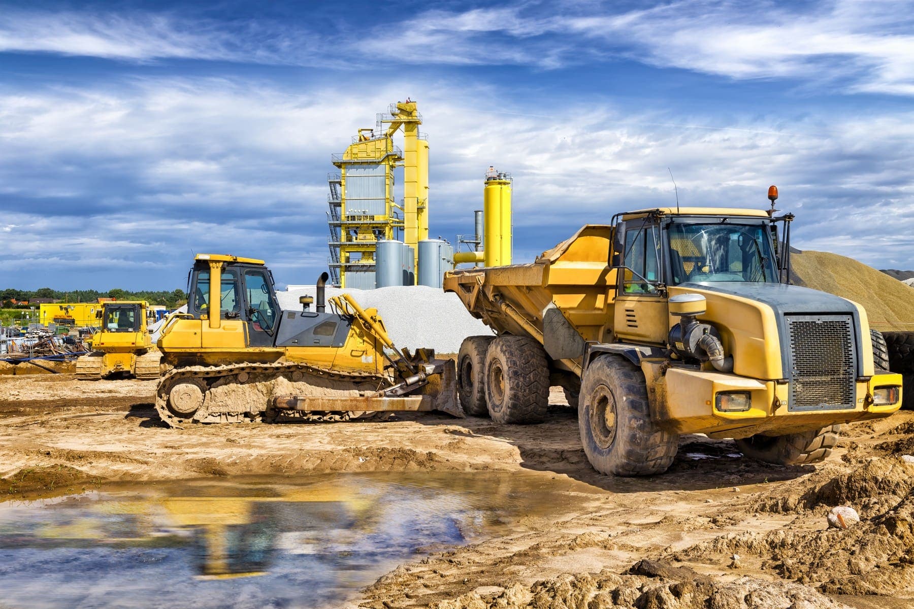 Equipment lined up across the dealership yard